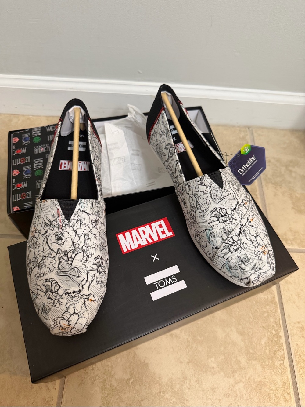 NWT Toms Marvel Concept Art Slip-On Flats in White and Black